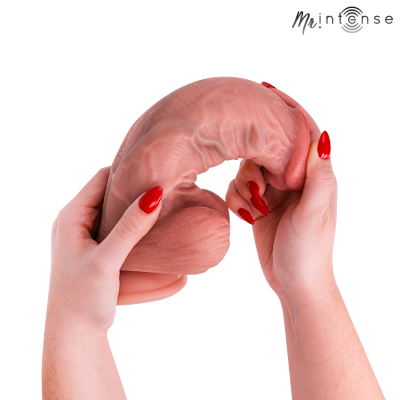 duas mãos segurando um objeto realista em forma de pénis, fundo branco, logo Mr!ntense