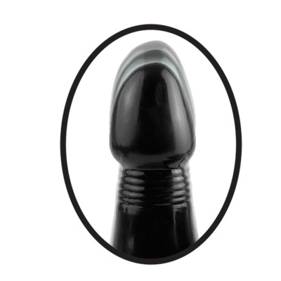 close-up de objeto preto arredondado com textura estriada