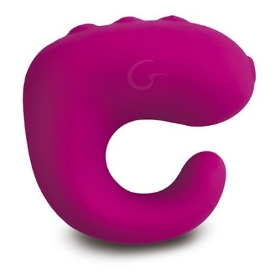 Produto em silicone roxo com forma curvada e textura lisa