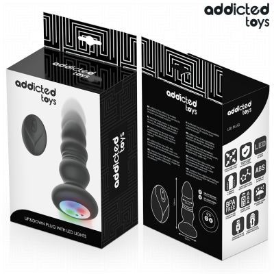 Caixa de brinquedo erótico plug LED preto com desenhos e texto da marca addicted toys
