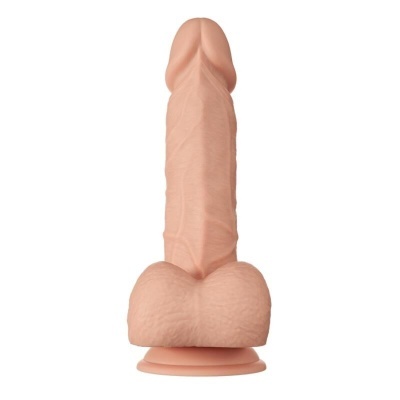 Dildo realista cor pele com ventosa e testículos em fundo branco