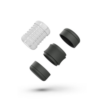 Conjunto de quatro peças cilíndricas com texturas variadas, uma branca transparente e três pretas, sobre fundo branco
