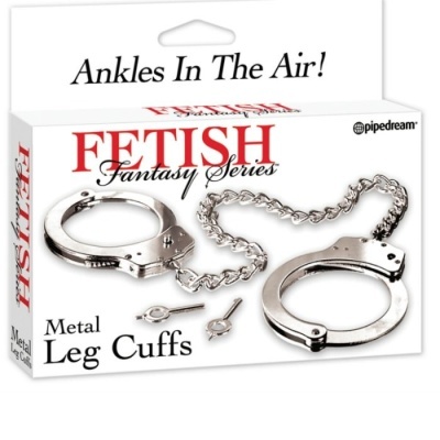 Caixa de algemas metálicas para pernas com corrente, texto 'FETISH Fantasy Series' e 'Ankles In The Air!'