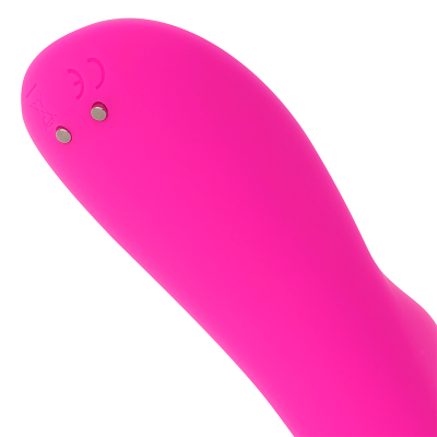 Produto cor-de-rosa em silicone com pequenos ímanes metálicos e símbolos CE