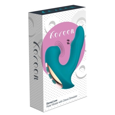 Vibrador azul turquesa em embalagem branca com texto e desenhos geométricos