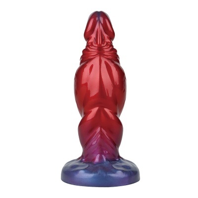 Objeto esculpido vermelho e azul com base circular