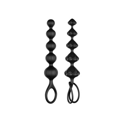 Dois brinquedos sexuais de silicone preto com bolinhas e argolas.