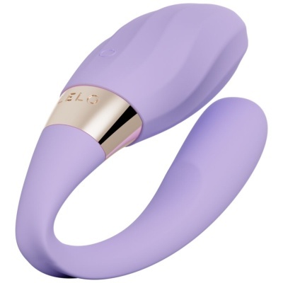 Dispositivo sexual roxo em silicone com detalhe metálico dourado e botão no topo