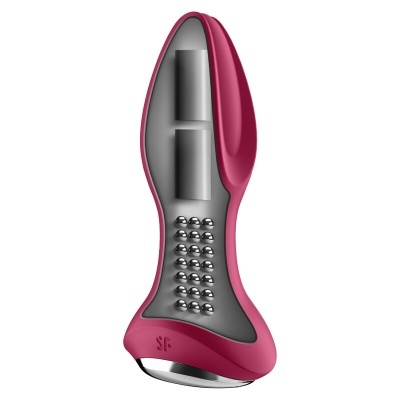 dispositivo tecnológico rosa com interior cinzento e esferas metálicas