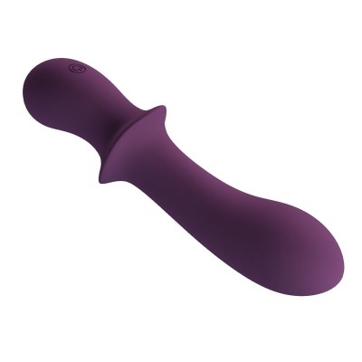 Acessório roxo de silicone com botão de power, fundo branco
