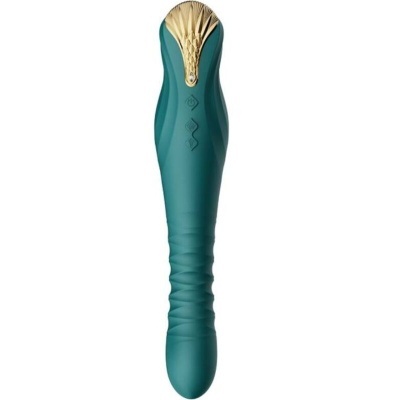 Vibrador verde-água com acabamento dourado e símbolos gravados