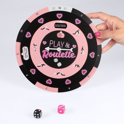 Disco circular rosa e preto para jogo com dados