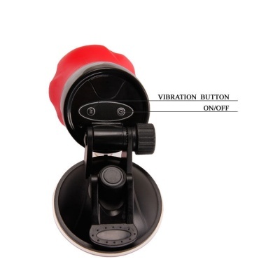 Dispositivo preto e vermelho com ventosa e botões etiquetados