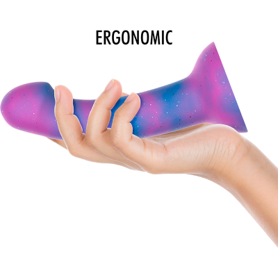 Objeto ergonómico roxo azul e rosa segurado por mão