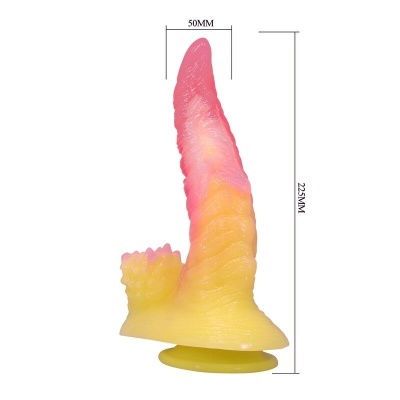 Objeto de silicone amarelo e rosa com base ventosa e textura irregular