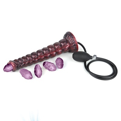 Objecto roxo texturizado com bomba de ar e acessórios pequenos