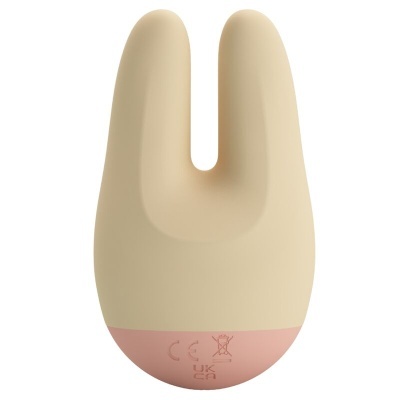 Produto de silicone bege com forma de orelhas de coelho e base rosa com símbolos gravados
