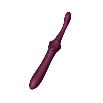 Vibrador cor vinho em silicone com dois botões, sobre fundo branco
