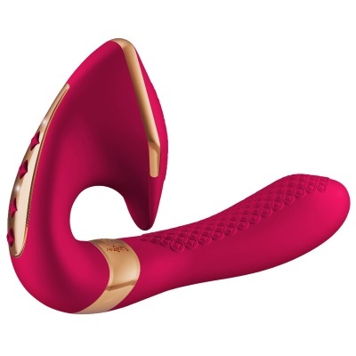 Vibrador vermelho com detalhes dourados e texturas