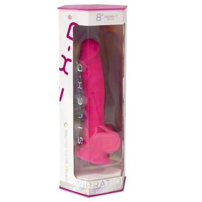 Vibrador rosa em silicone numa embalagem transparente hexagonal