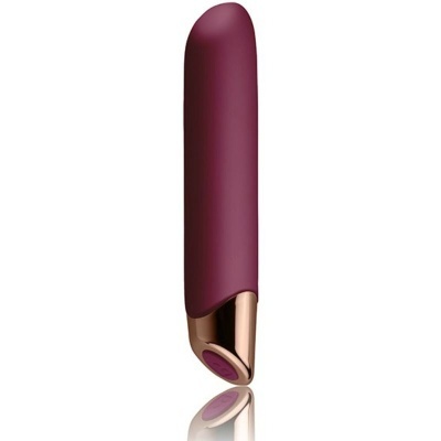 Vibrador roxo com base metálica dourada e botão na base