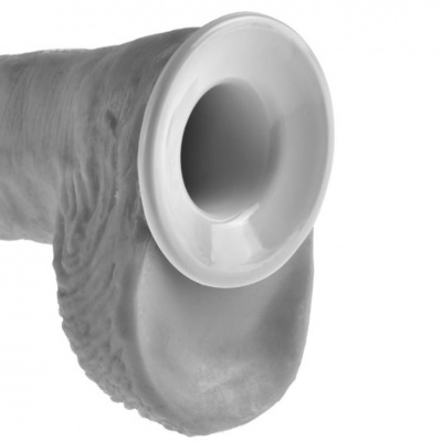 Acessório de plástico branco encaixado em peça de silicone cinza com textura irregular