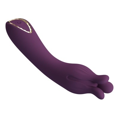 Vibrador roxo em silicone com acabamento dourado em fundo branco