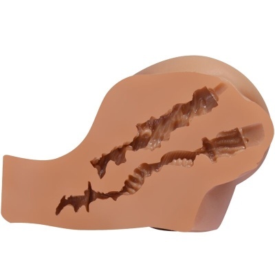 Molde de silicone castanho com cavidades longas e irregulares