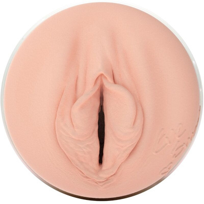 Objecto circular com textura e cor pele, representando uma genitália feminina