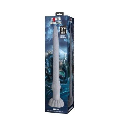 Dildo de silicone cinza com textura escamada em embalagem azul com imagem de monstro e texto