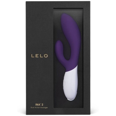 Massageador dual action INA 2 LELO roxo e branco na caixa preta