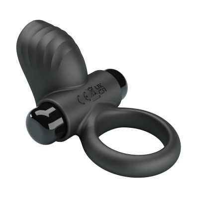 anel vibratório preto com textura ondulada e anel circular