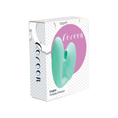Embalaem de produto branco com pontos cinzentos e texto roxo 'Koroon' e imagem de acessório verde