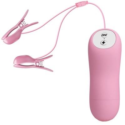 Controle remoto rosa com dois clips de molas em fundo branco