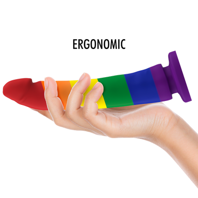 Produto sexual ergonómico com cores do arco-íris segurado numa mão