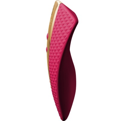 Produto rosa texturizado com acabamentos dourados, vista lateral