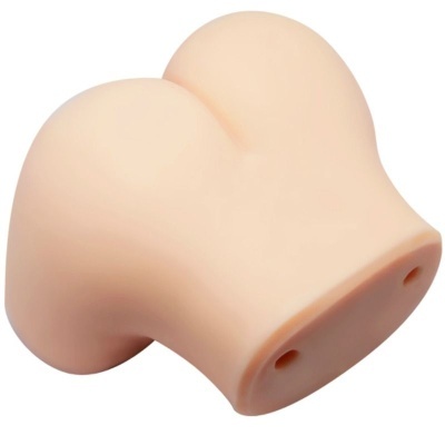 Produto em silicone cor bege com formato anatómico arredondado e duas aberturas na base