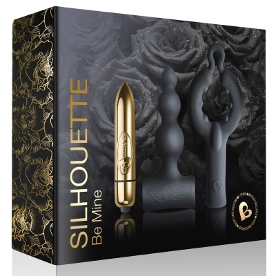 Caixa preta com design floral dourado e produtos sexuais em silicone preto e vibro dourado