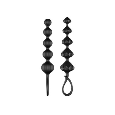 Dois conjuntos pretos de contas anais de silicone com texturas diferentes e anel para manuseio.
