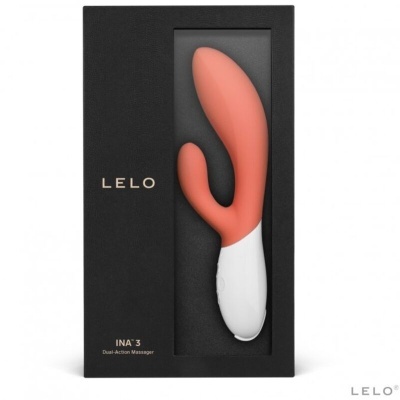 Vibrador coral e branco na caixa preta da LELO