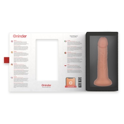 Dildo em cor pele com caixa aberta mostrando textos explicativos