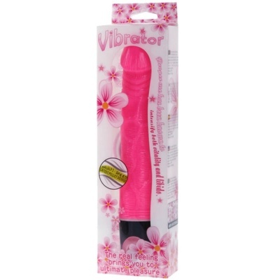 Vibrador cor-de-rosa com base preta em caixa transparente com flores rosa e texto