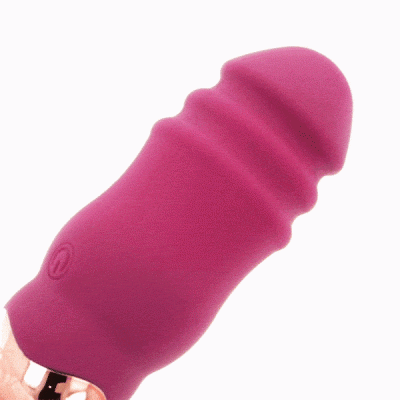 Vibrador portátil rosa com superfície ondulada e botão circular