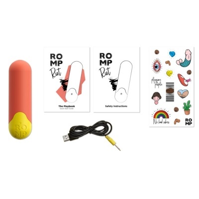 Dispositivo cilíndrico ferrugem com base amarela, dois manuais ROMP Rust, cabo USB preto e autocolantes coloridos.