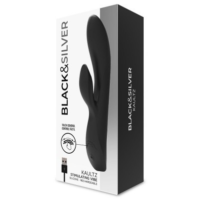 Embalagem do produto vibrador preto com duas extensões, texto BLACK&SILVER e outros detalhes visíveis.