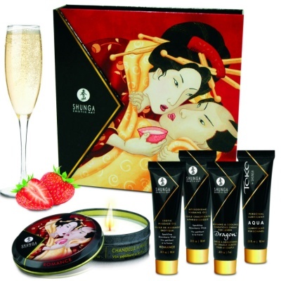 Conjunto Shunga Erotic Art com velas, tubos cosméticos pretos e bebida com morangos