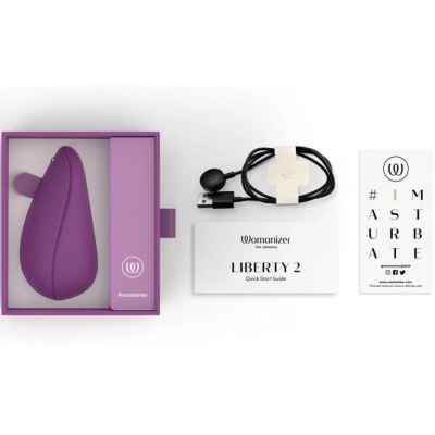 Produto roxo dentro de caixa roxa com cabo USB, guia rápido e cartão com texto