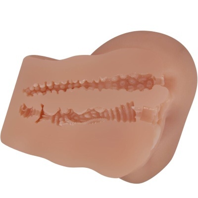 Produto em silicone bege com cavidades texturizadas incluindo esferas e anéis.