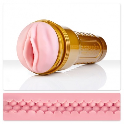 Masturbador masculino cor-de-rosa com estrutura dourada e interior texturizado