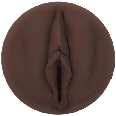 Objeto circular castanho com abertura central e textura semelhante à pele